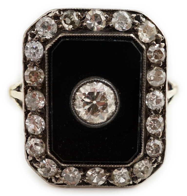 A 1940's? gold, black onyx and diamond cluster set tablet ring